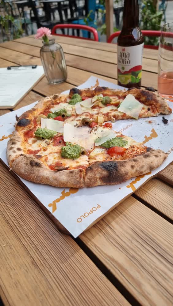 Pizza with pesto and parmesan