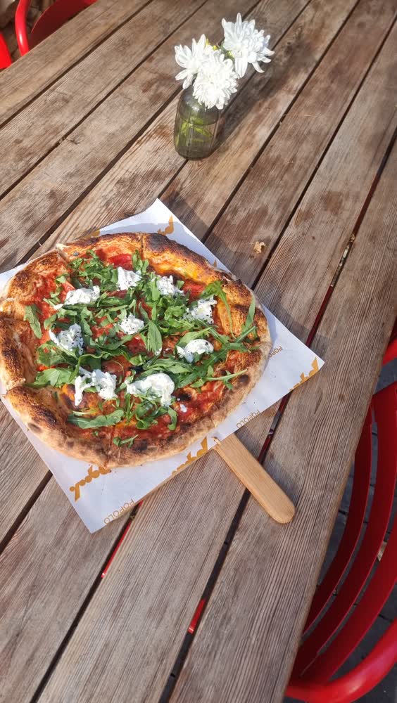 Pizza with ricotta and arugula